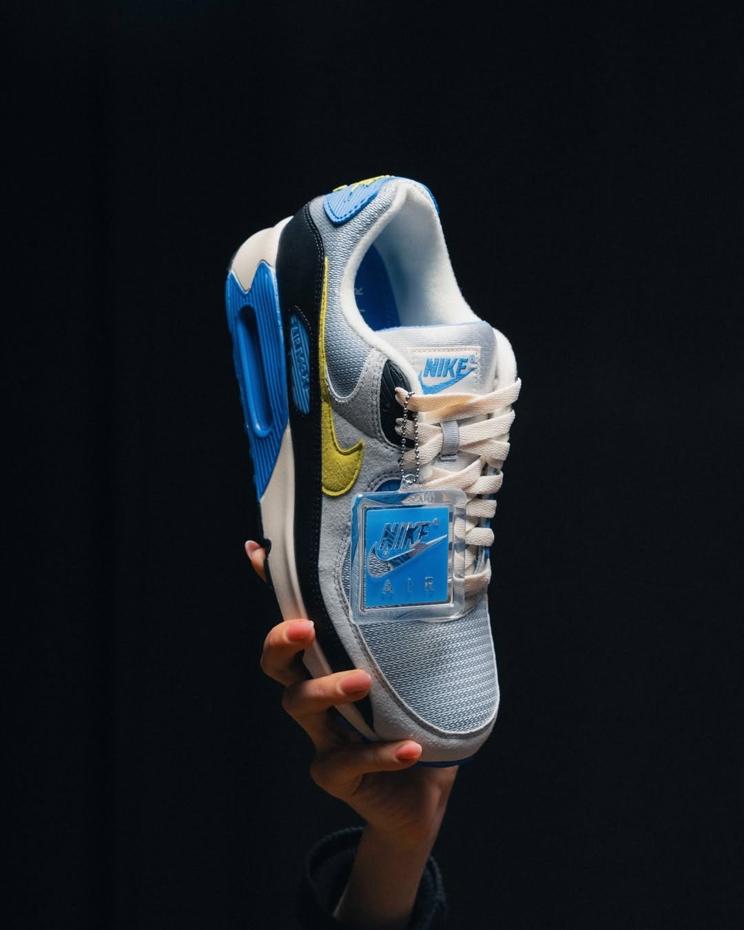 Nike Air Max 90 Photon Dust and Blue IU7543-025 in Hand