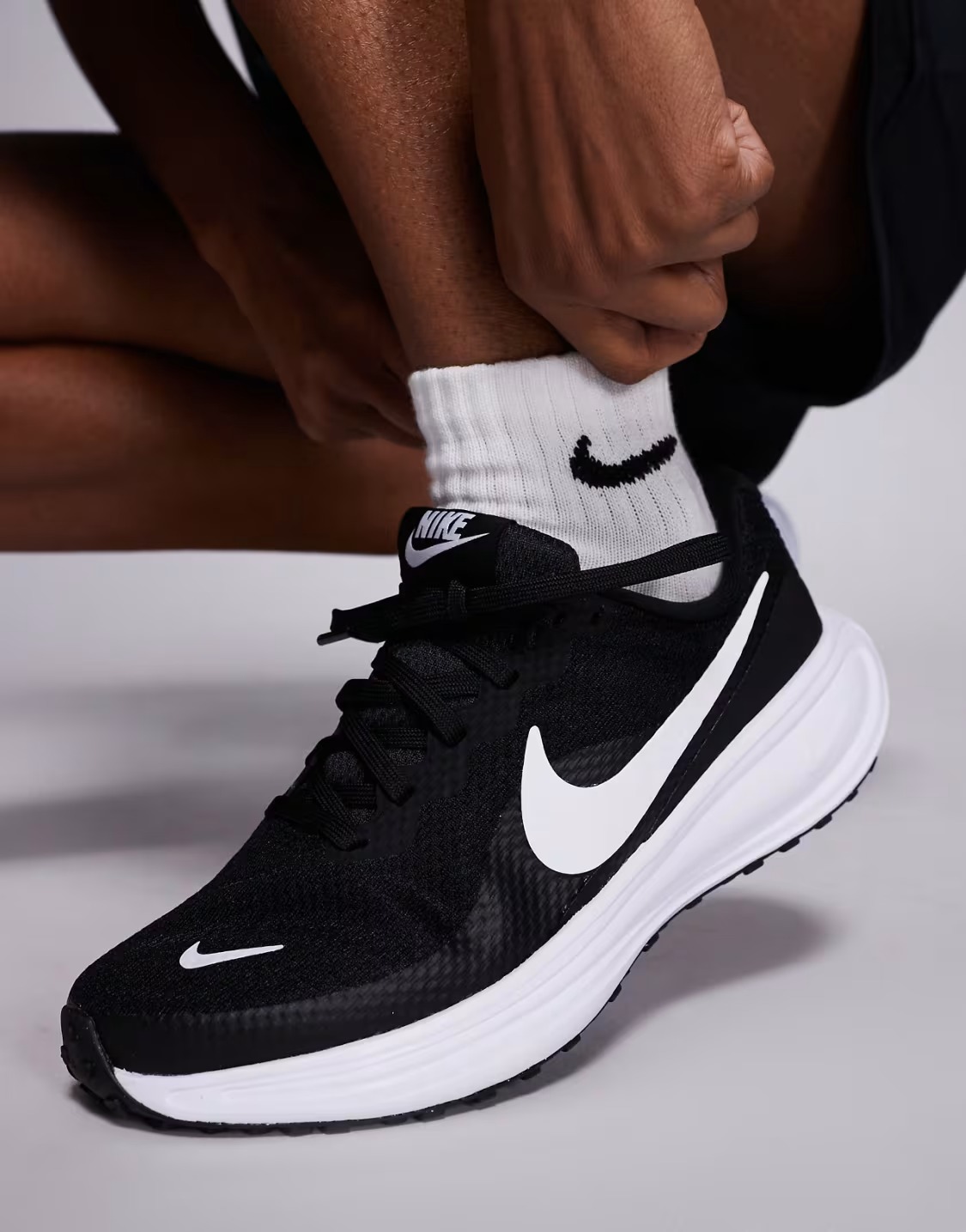 Nike Revolution 8 HJ9198-003 on Feet Nike Socks