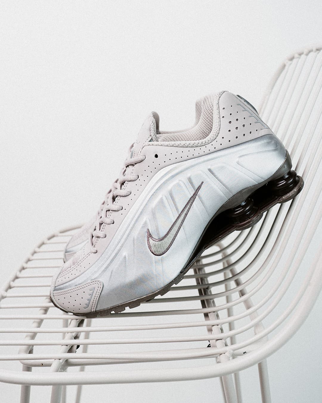 Nike Shox R4 Cave Stone College Grey HQ1988-200 Lateral on Chair